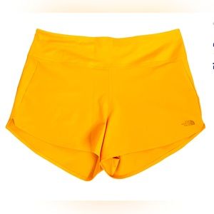 NWT THE NORTH FACE ARQUE SHORT IN SUMMIT GOLD. SIZE LARGE